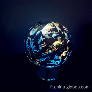 Lampe globe terrestre illuminée avec constellations